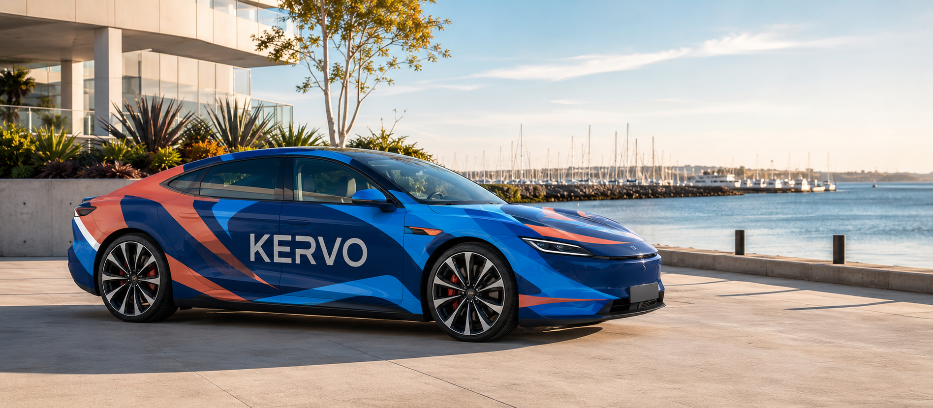 A fully wrapped Kervo campaign vehicle at a waterfront